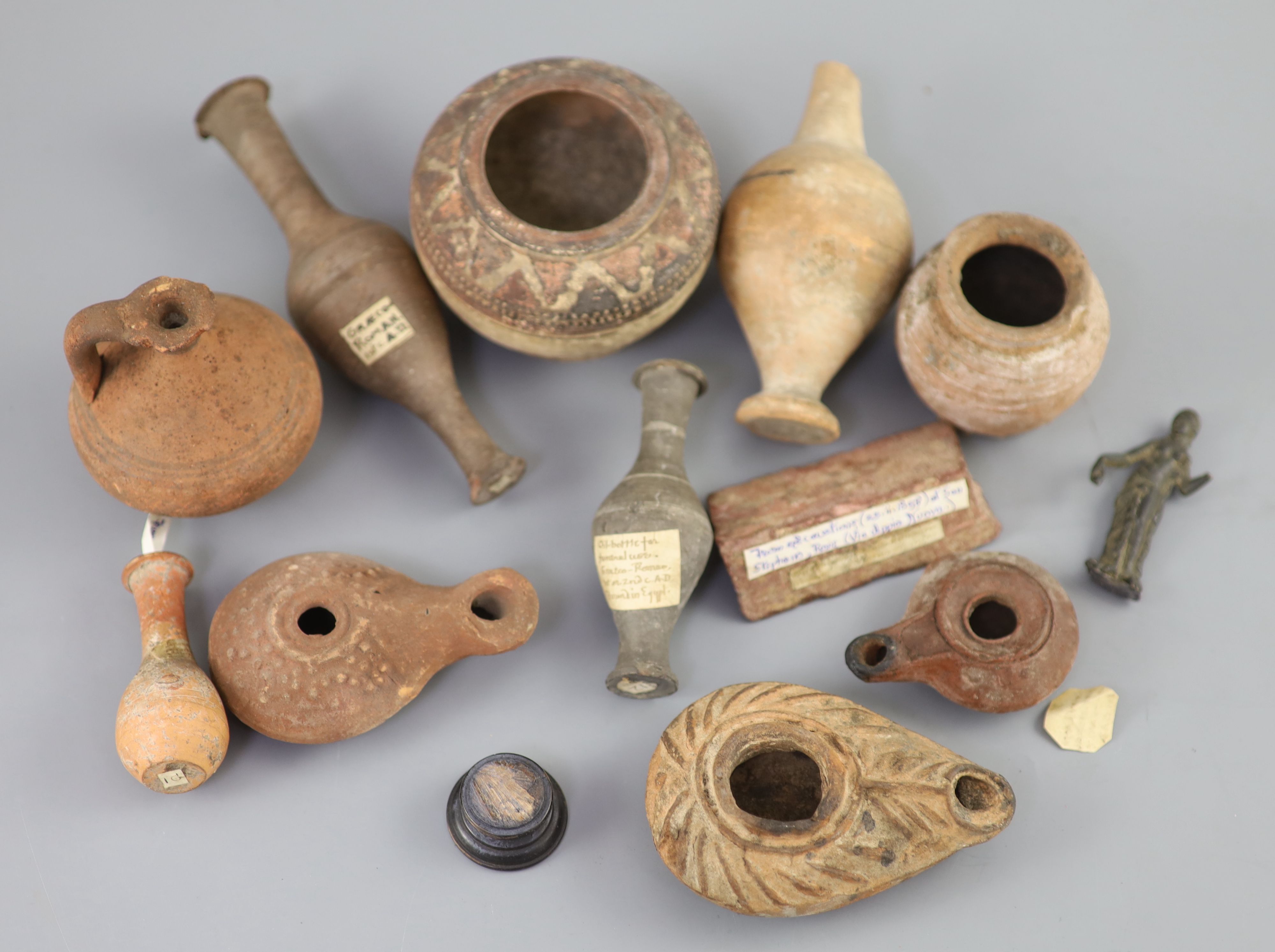 A group of Ancient Roman pottery vessels and a bronze statuette of Venus, mostly 1st-4th century AD, Provenance - A. T. Arber-Cooke